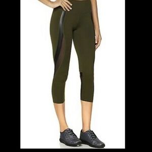 The Warm Up Green Capri Leggings